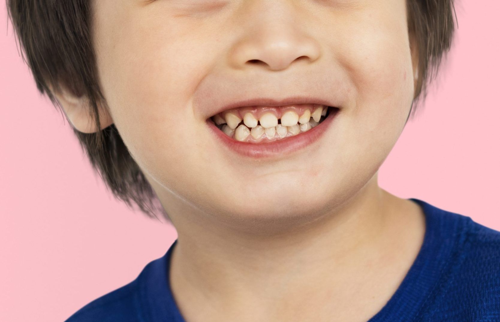 happy-little-asian-boy-smiling-face-portrait-scaled-e1733449310160.jpg
